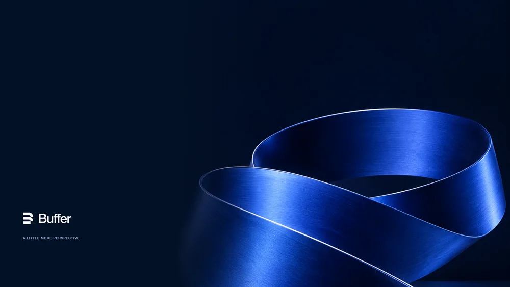 A 4K cobalt sculpture with deep navy space and an understated wordmark.